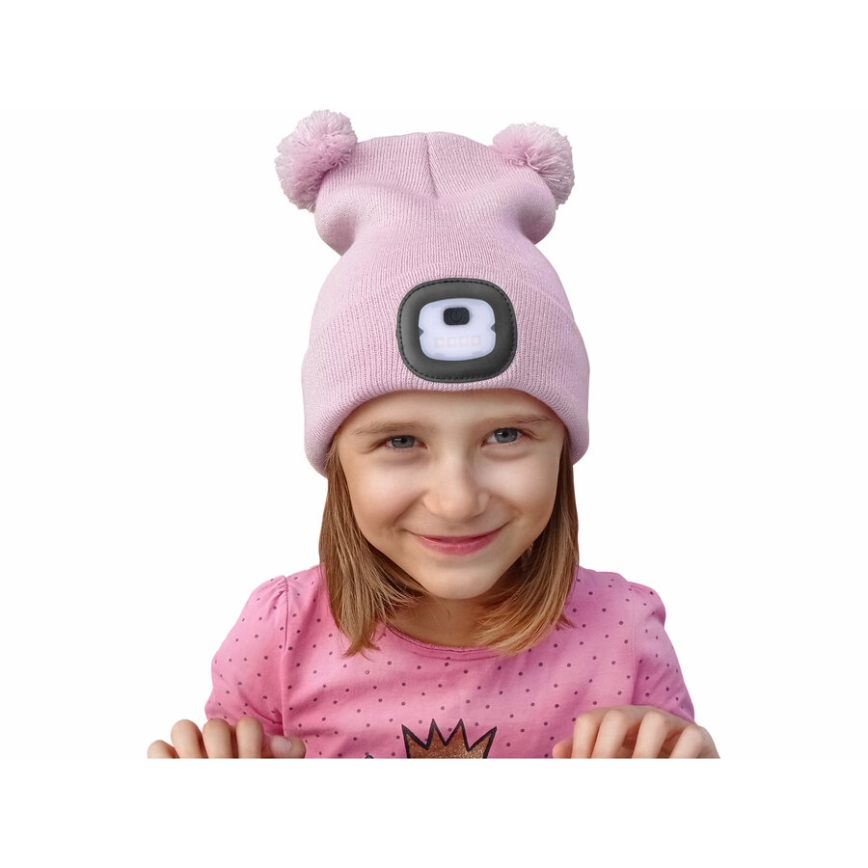 Extol - Children's beanie with built-in USB-rechargeable 250 mAh LED headlamp, pink with pom-poms