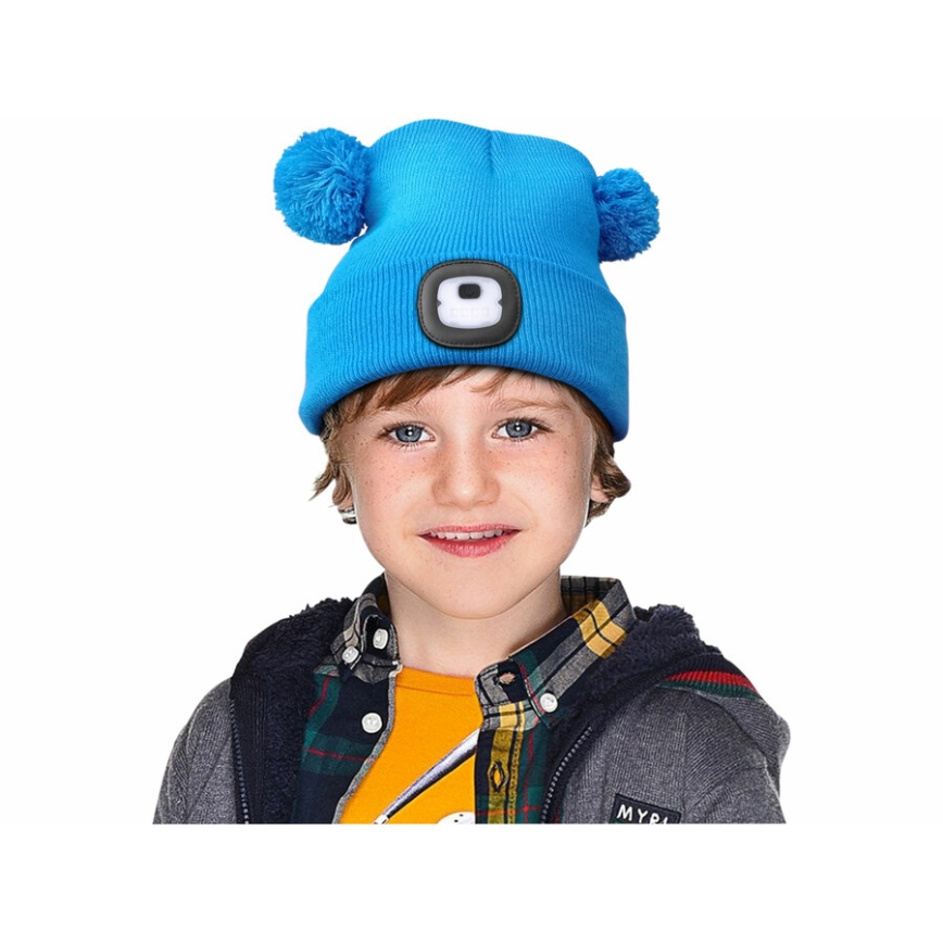 Extol - Kids' beanie with headlamp, USB-rechargeable 250 mAh, blue with pom-poms