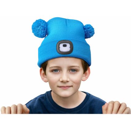 Extol - Kids' beanie with headlamp, USB-rechargeable 250 mAh, blue with pom-poms