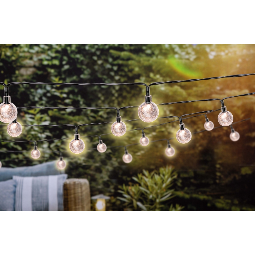 Grundig - LED Dimmable solar chain 50xLED/8 functions 9,35m IP44 warm white + remote control
