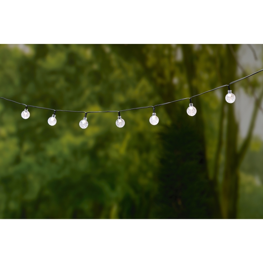 Grundig - LED Solar chain 50xLED/8 functions 6,9m warm white