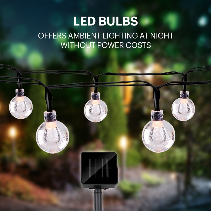 Grundig - LED Solar chain 50xLED/8 functions 6,9m warm white