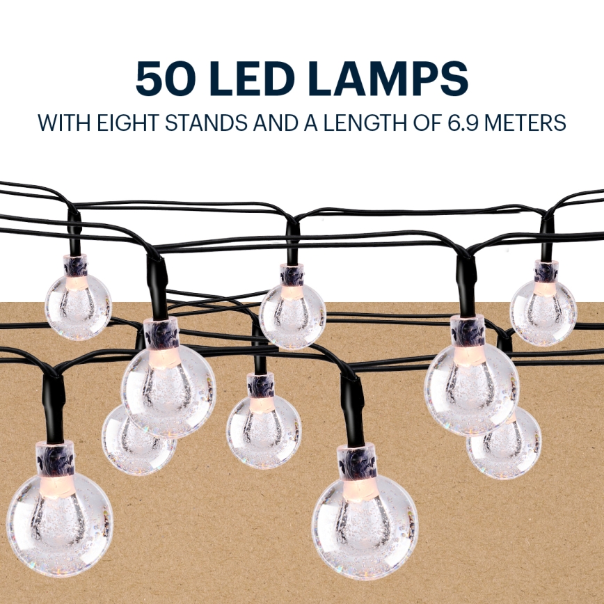 Grundig - LED Solar chain 50xLED/8 functions 6,9m warm white