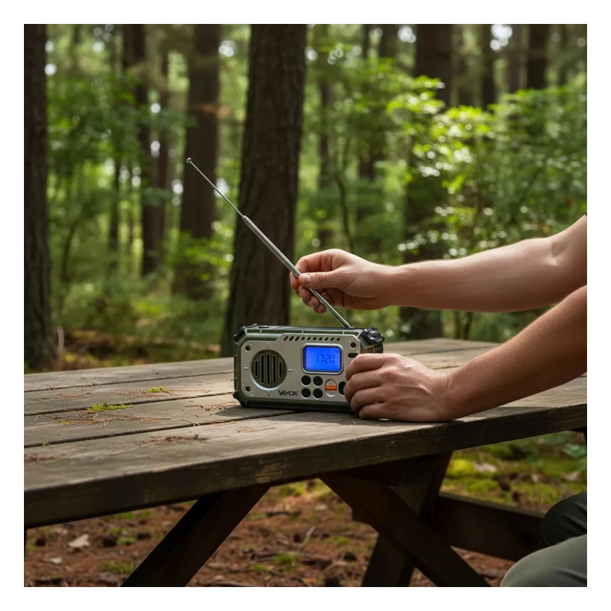 Camping radio with hand crank, solar panel and LED flashlight with power bank function, 5V / 3×AAA / 2000 mAh, IPX4, green