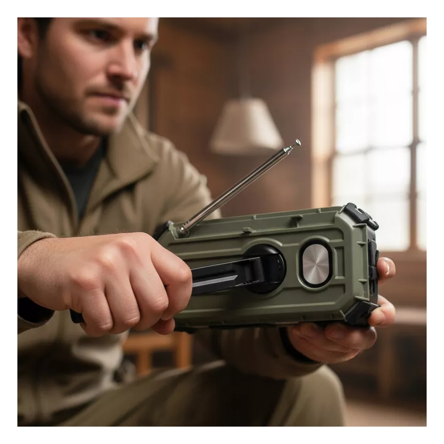 Camping radio with hand crank, solar panel and LED flashlight with power bank function, 5V / 3×AAA / 2000 mAh, IPX4, green