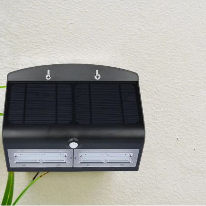LED Solar wall light with a sensor LED/7W/3,7V 4000K IP65 black
