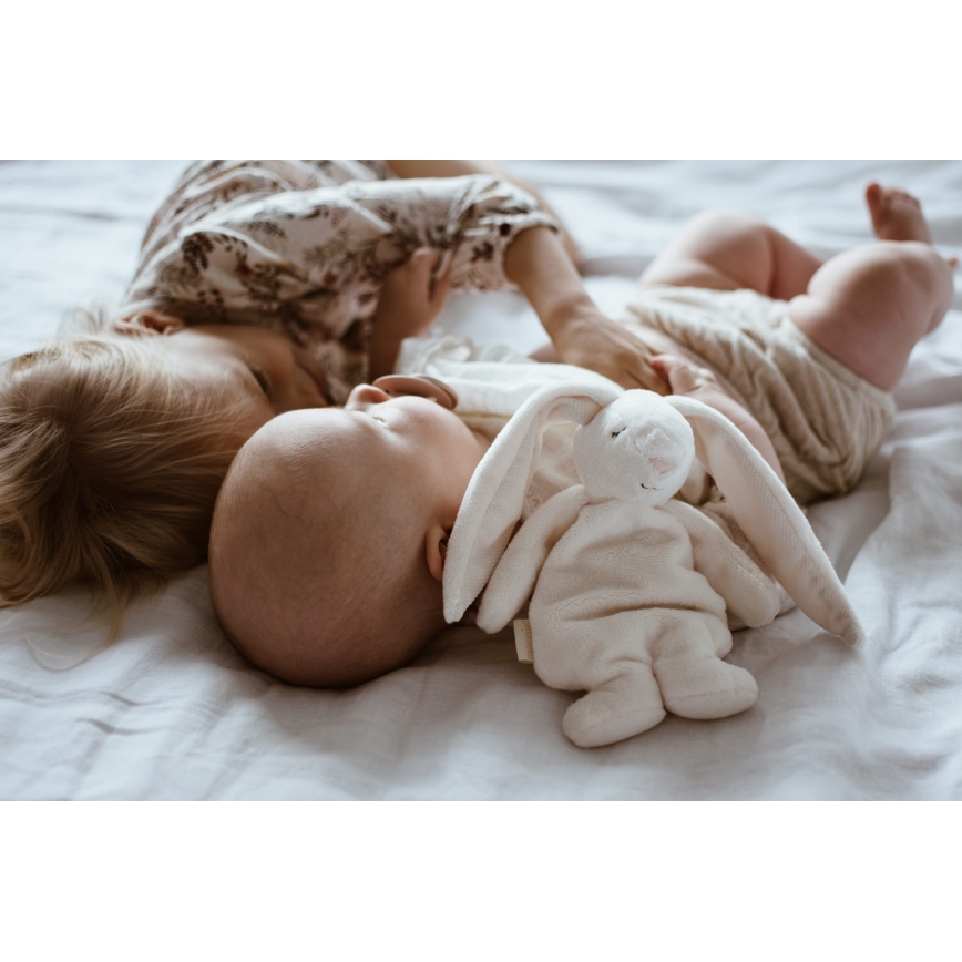 Moonie - Snuggle buddy with a melody and light bunny cream