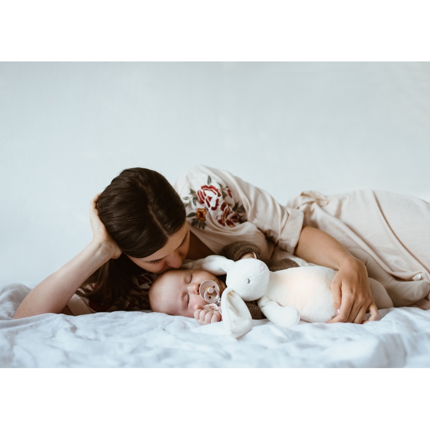Moonie - Snuggle buddy with a melody and light bunny cream