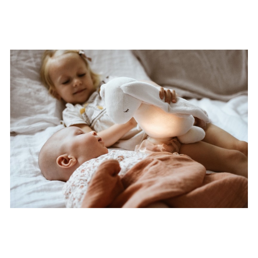 Moonie - Snuggle buddy with a melody and light bunny powder