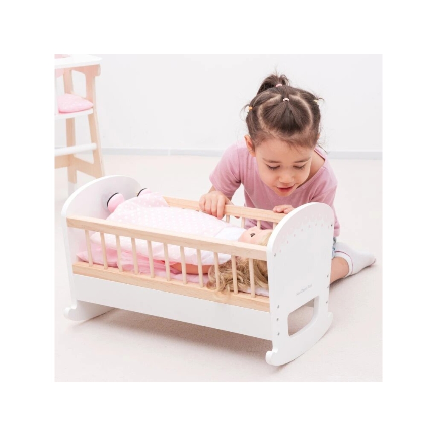 New Classic Toys - Wooden bed for dolls pink