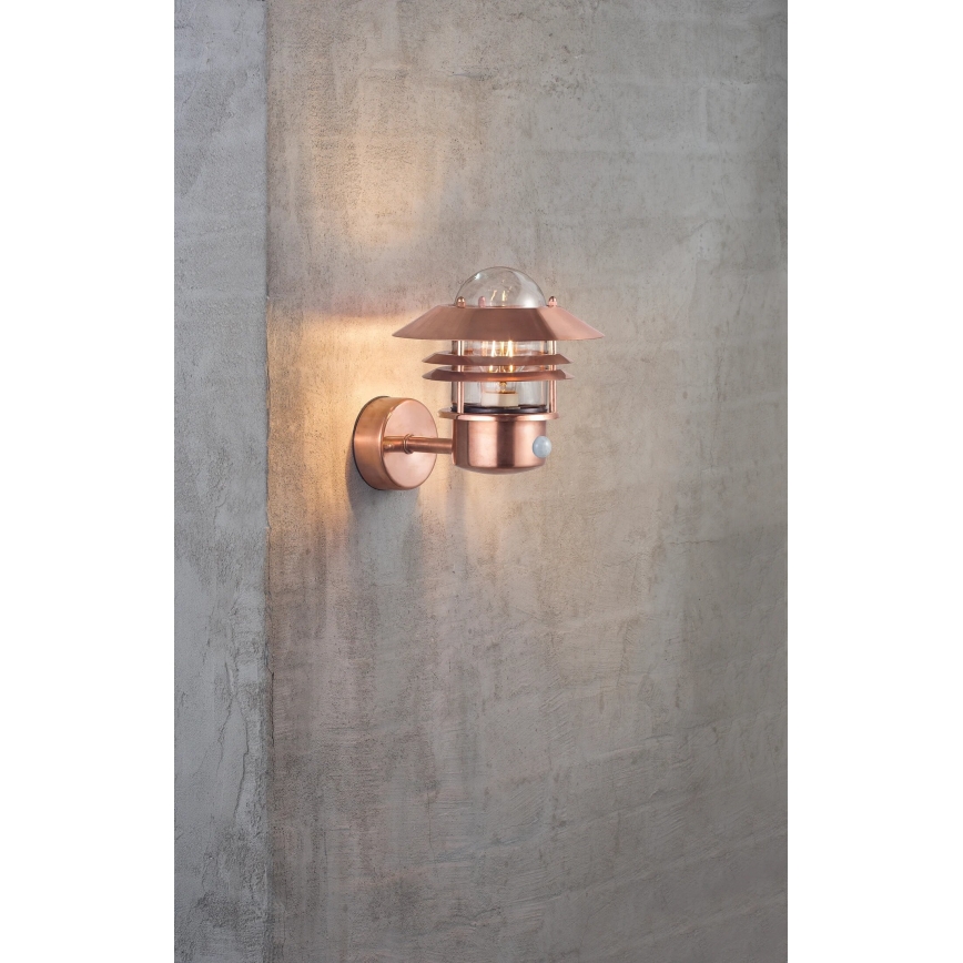 Nordlux - Outdoor wall light with a sensor BLOKHUS 1xE27/60W/230V IP54 copper
