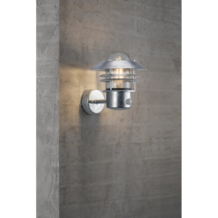 Nordlux - Outdoor wall light with a sensor BLOKHUS 1xE27/60W/230V IP54 silver