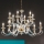 Ondaluce - Chain chandelier 1306 12xE14/10W/230V Ø 100 cm gold/clear
