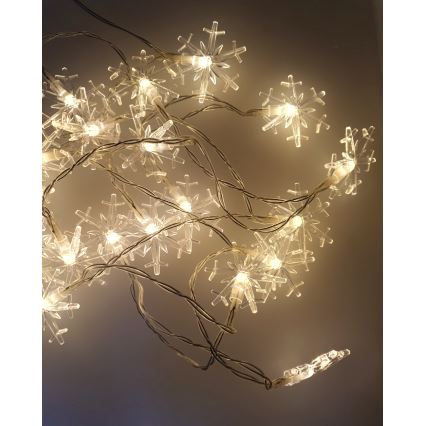 Outdoor LED string lights, 20 LEDs, battery-powered (2xAA), 2.2 m, IP44, warm white, snowflake design