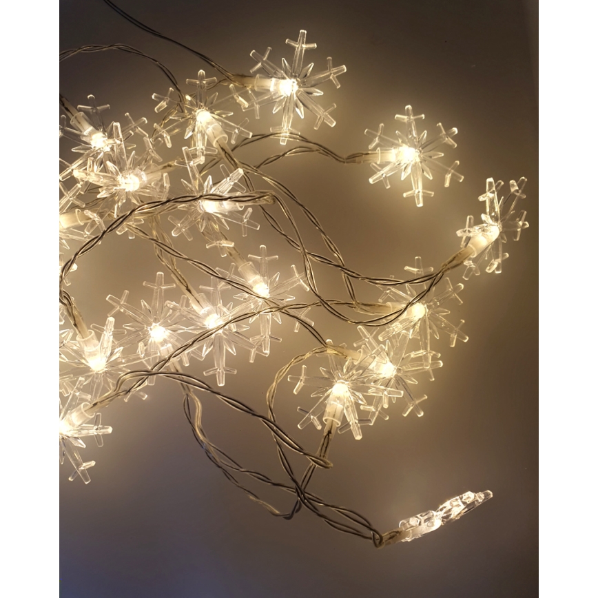 Outdoor LED string lights, 20 LEDs, battery-powered (2xAA), 2.2 m, IP44, warm white, snowflake design