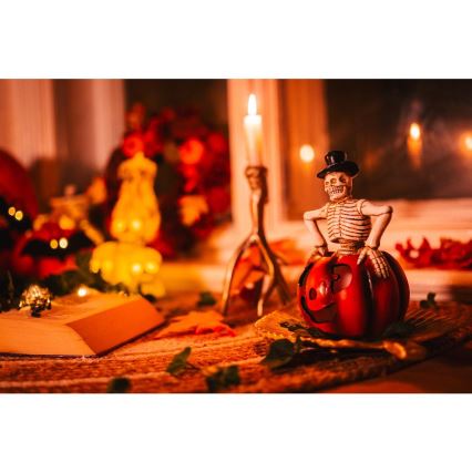 LED Decoration HALLOWEEN LED/2xLR44/warm white skeleton in a pumpkin resin