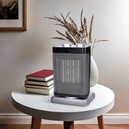 Tower fan with integrated 1500W/230V heating element