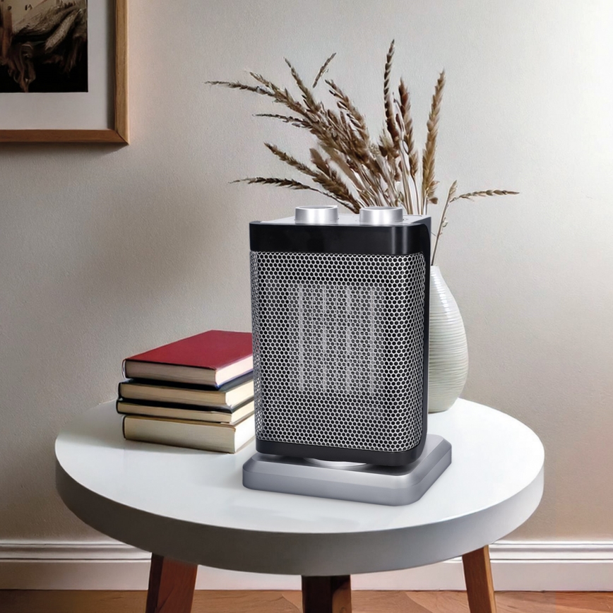 Tower fan with integrated 1500W/230V heating element