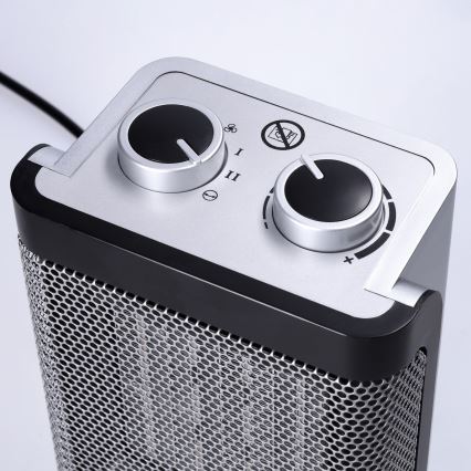 Tower fan with integrated 1500W/230V heating element