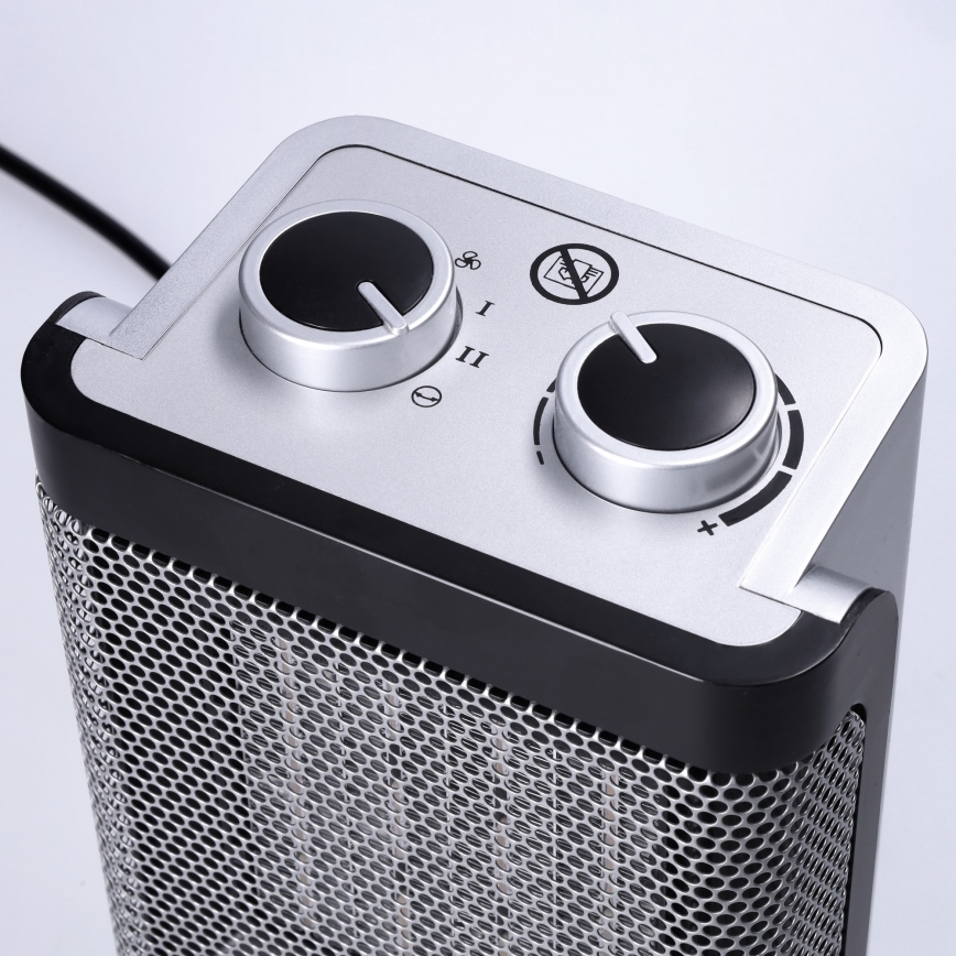 Tower fan with integrated 1500W/230V heating element