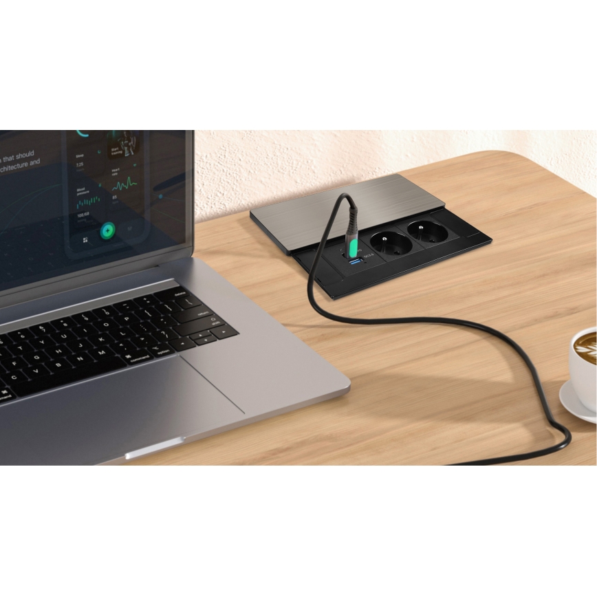 Built-in power outlet with 20W wireless charging — dual sockets + USB-A + USB-C