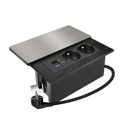 Built-in power outlet with 20W wireless charging — dual sockets + USB-A + USB-C